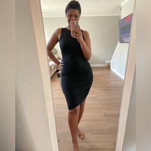 Bodycon black dress with ruching on the side